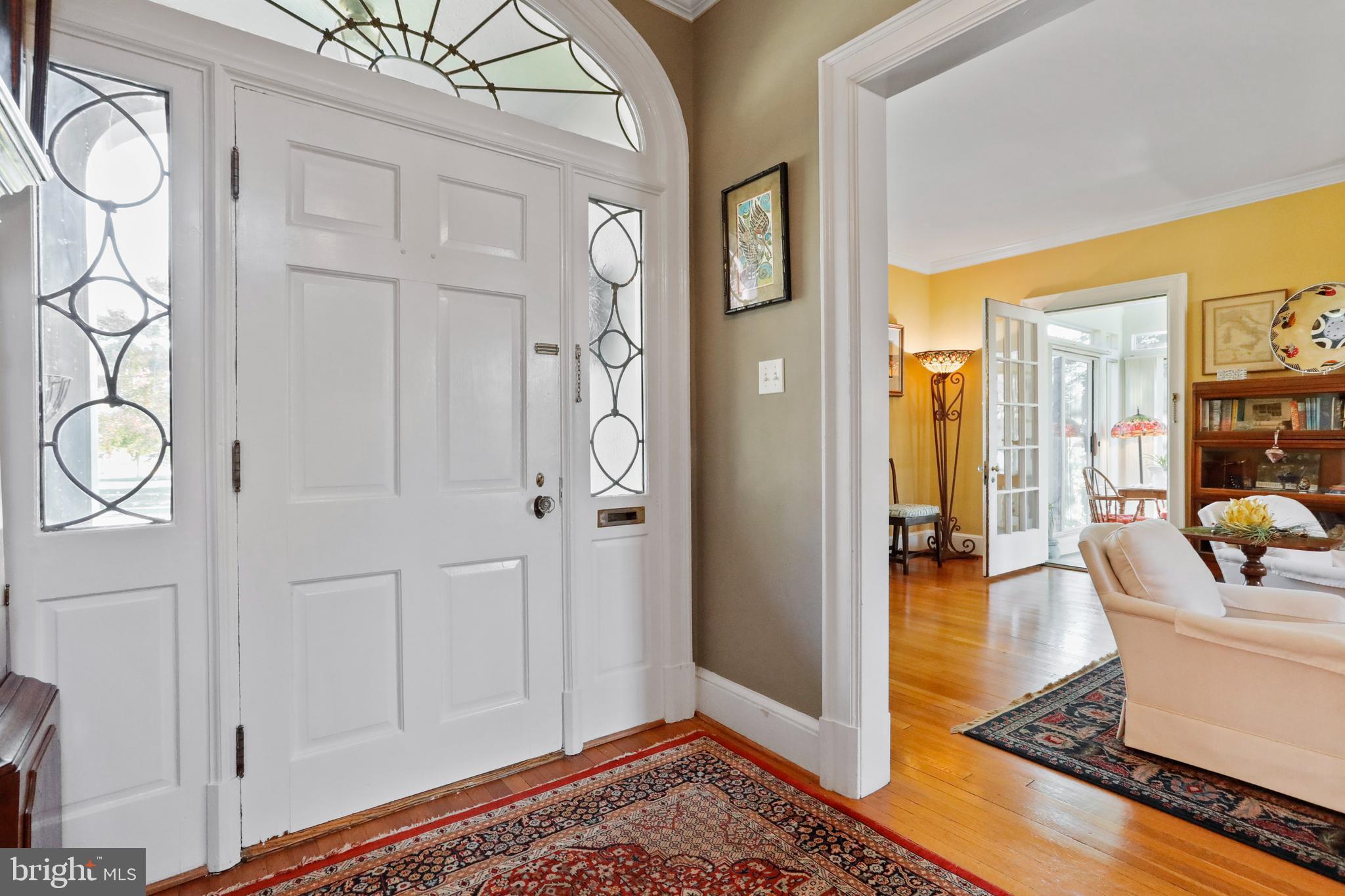 305 College Place Frederick, MD 21701 - Photo 6 of 71 a view of a livingroom with wooden floor and furniture