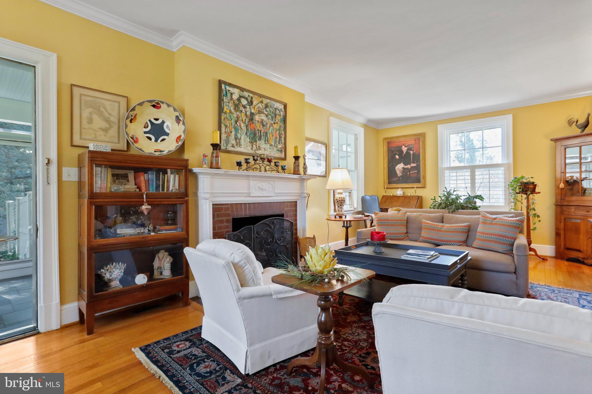 305 College Place Frederick, MD 21701 - Photo 9 of 71 a living room with furniture and a fireplace
