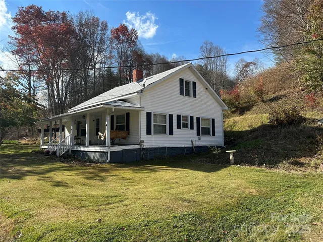 a view of a house with a big yard