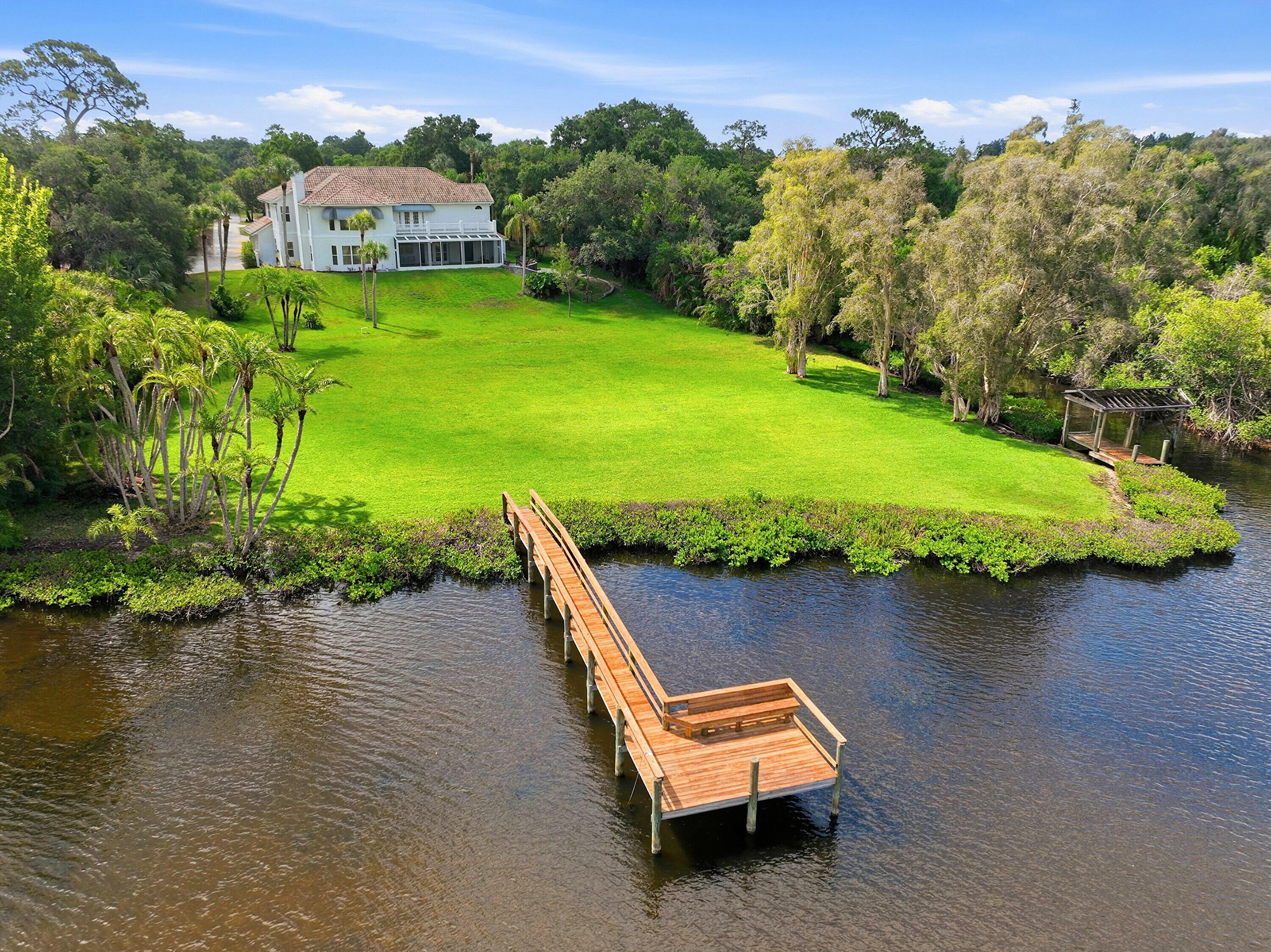 12765 Roseland Road Sebastian, FL 32958 - Photo 58 of 93 Dock & Back Yard