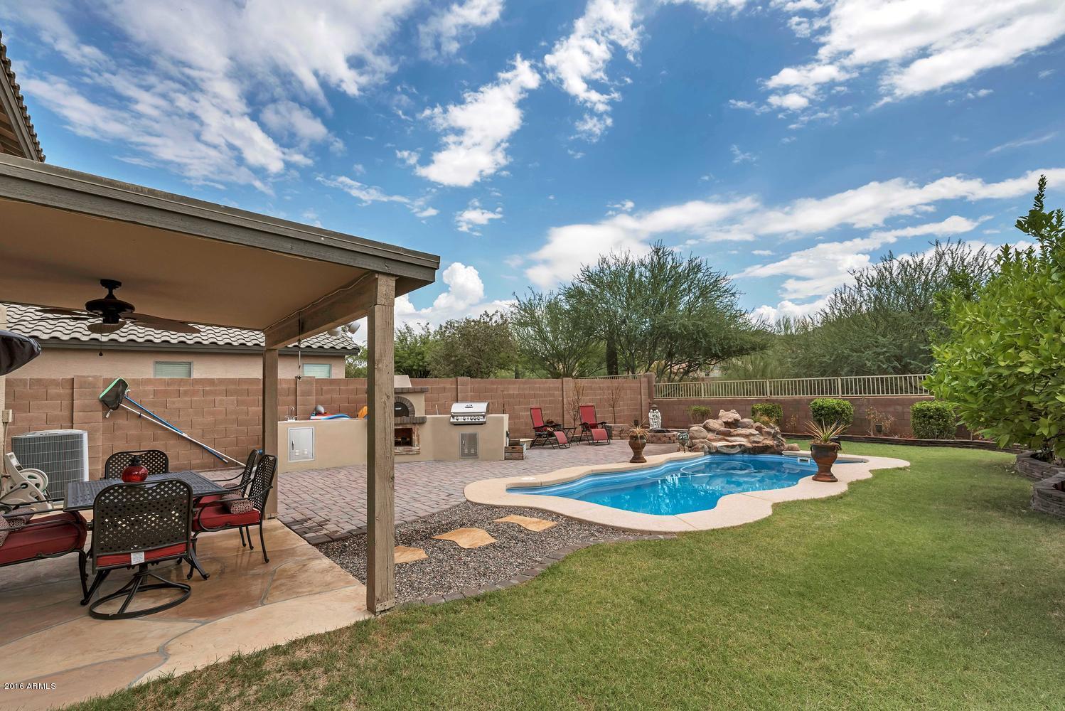28615 North Nobel Road Phoenix, AZ 85085 - Photo 23 of 27 a view of swimming pool with outdoor seating