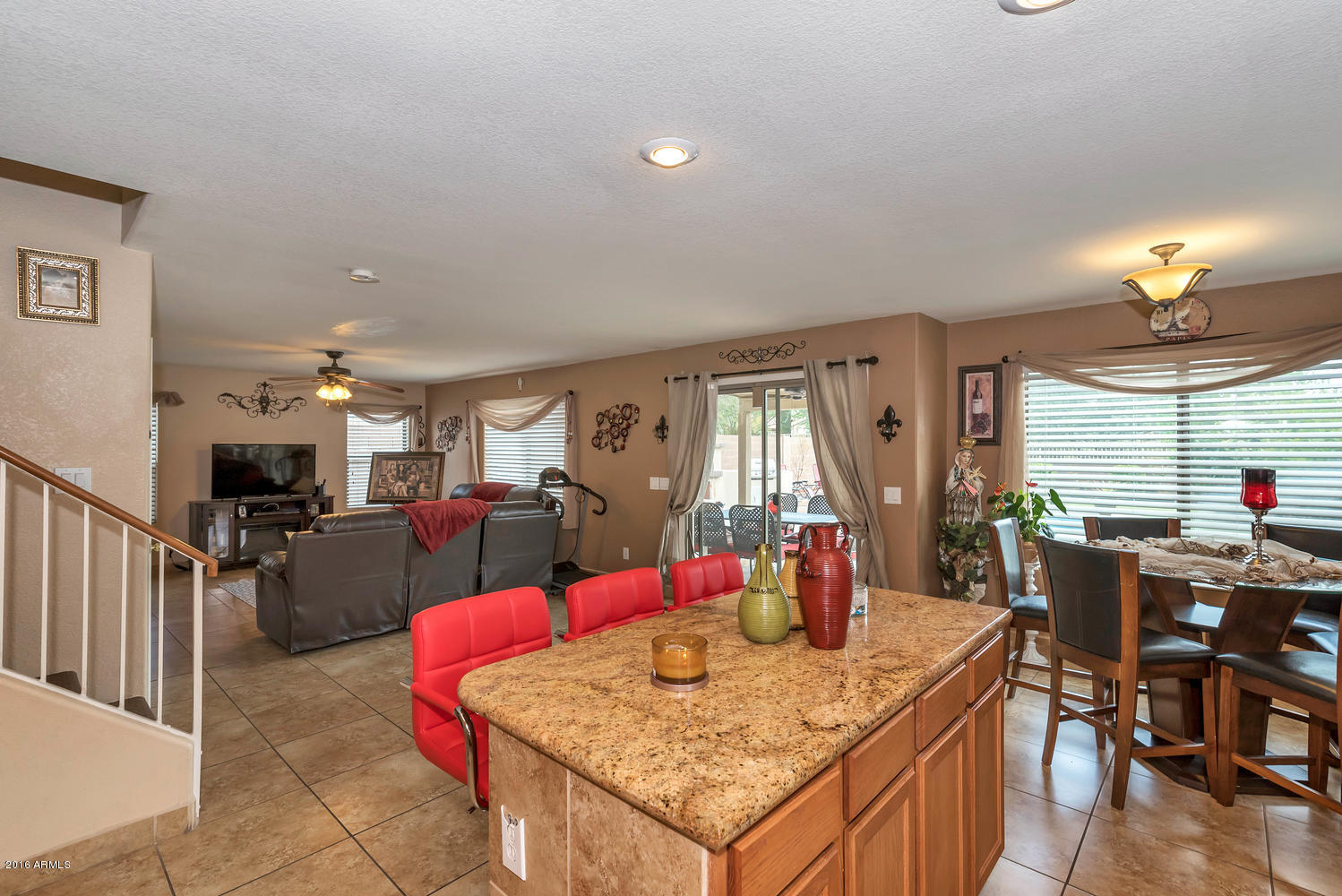 28615 North Nobel Road Phoenix, AZ 85085 - Photo 9 of 27 a living room with furniture and a large window