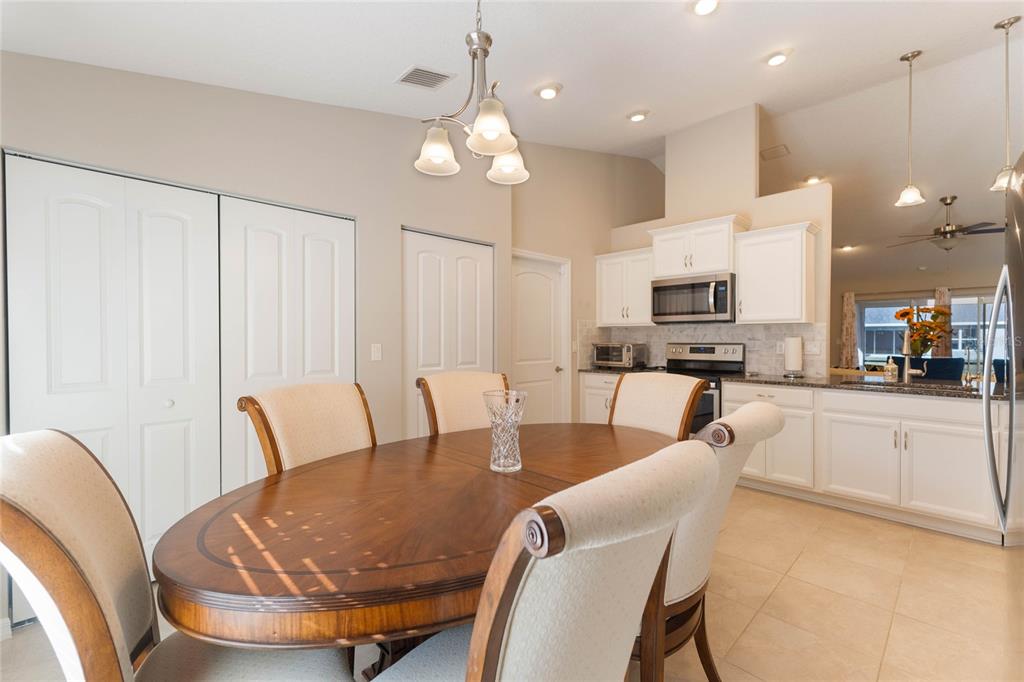 15 Raeland Lane Palm Coast, FL 32164 - Photo 4 of 13 a view of a dining room with furniture