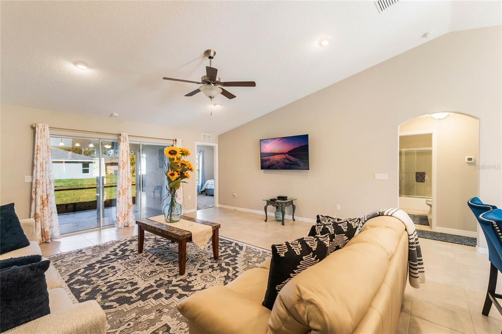 15 Raeland Lane Palm Coast, FL 32164 - Photo 6 of 13 a living room with furniture and wooden floor