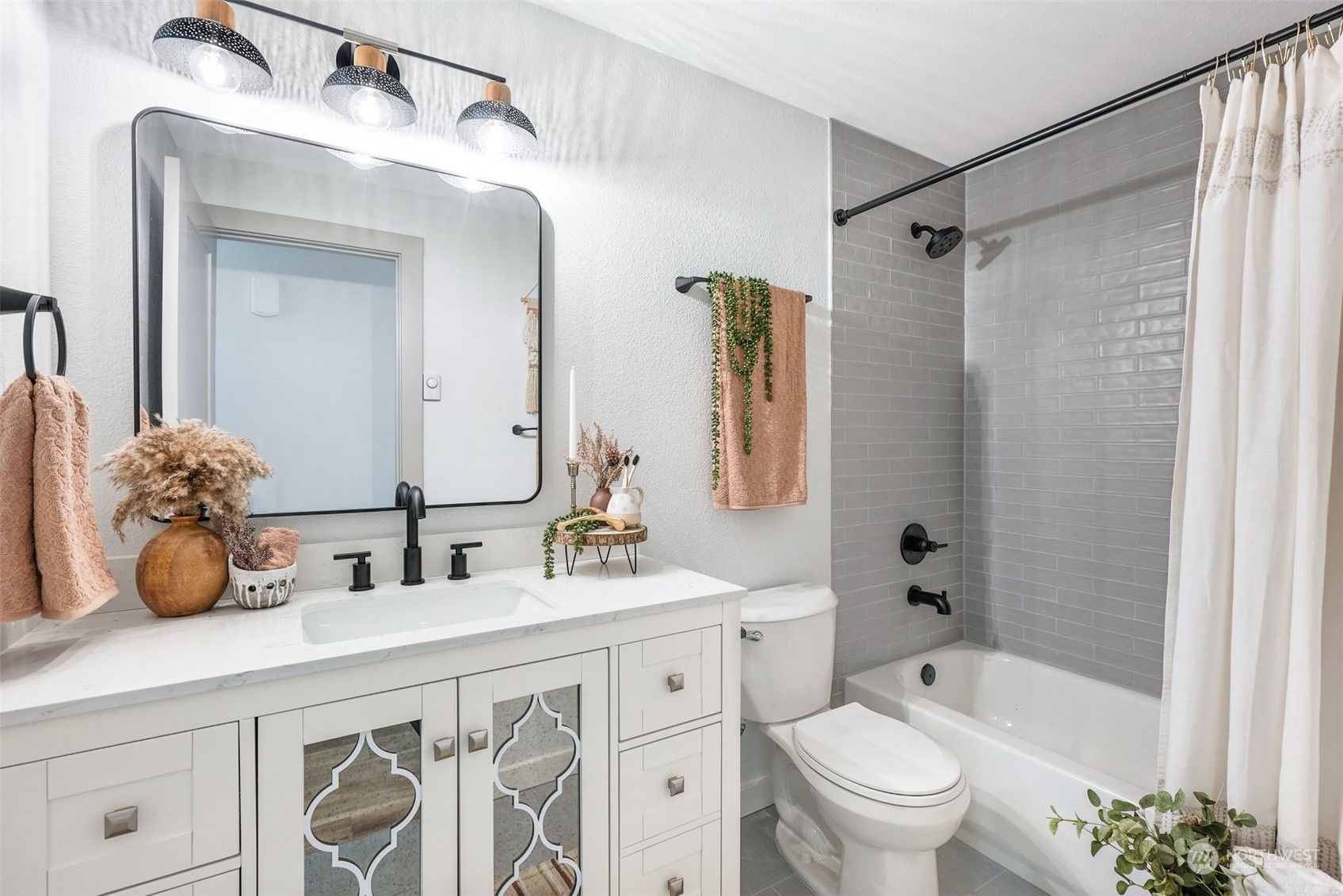 2411 Cedar Road Lake Stevens, WA 98258 - Photo 21 of 36 a bathroom with a double vanity sink toilet mirror and shower