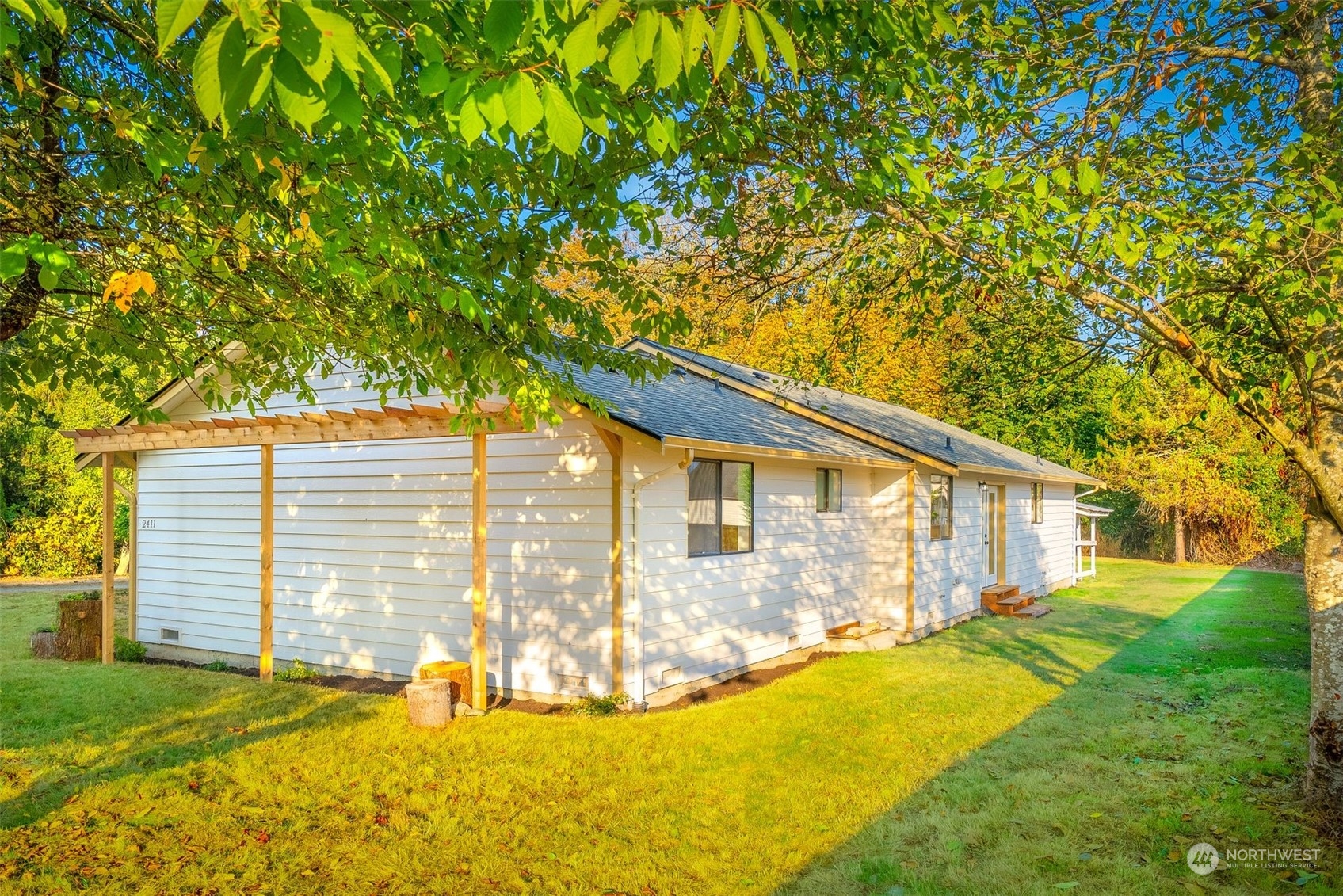 2411 Cedar Road Lake Stevens, WA 98258 - Photo 24 of 36 a view of a house with backyard and sitting area
