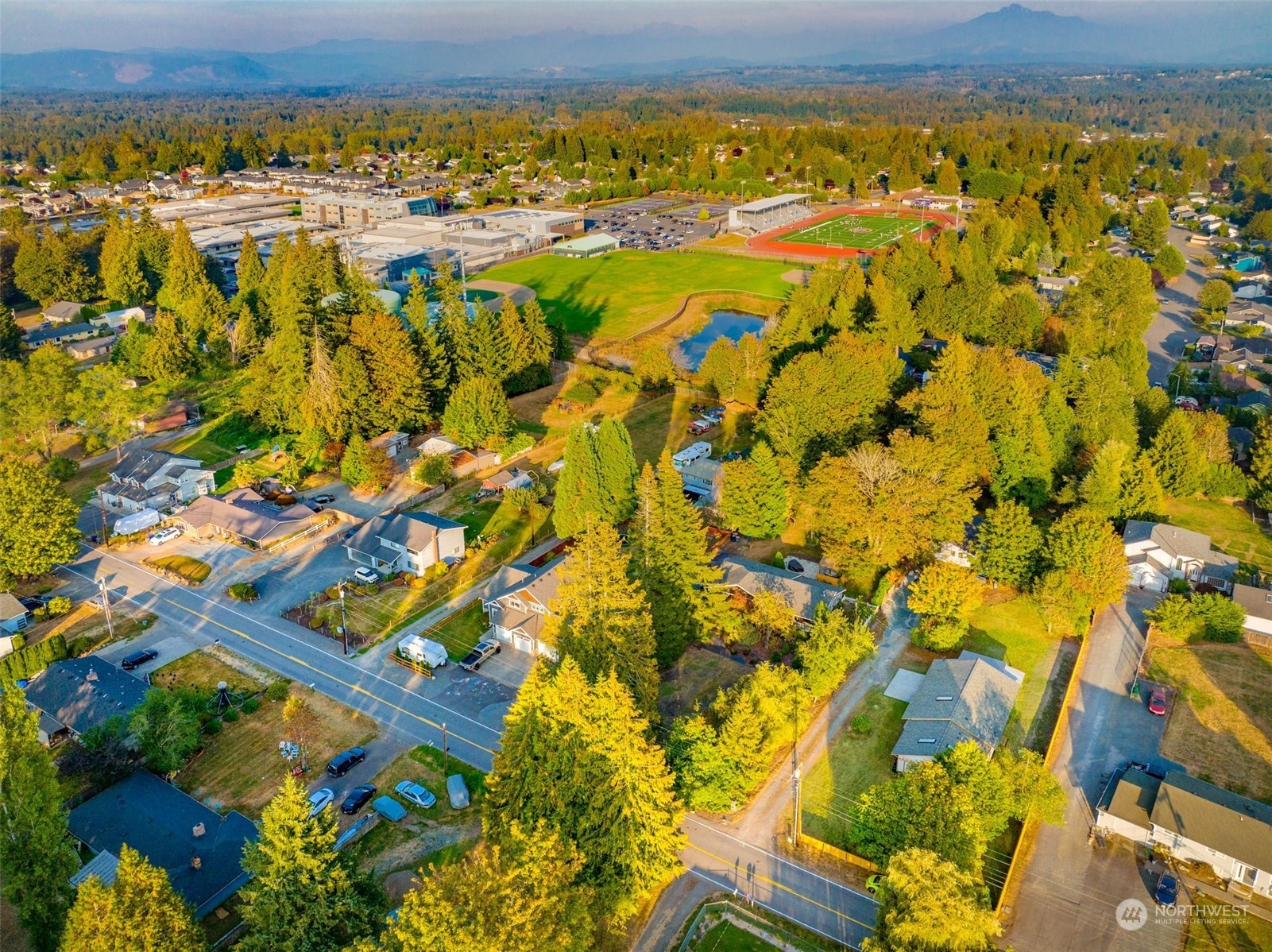 2411 Cedar Road Lake Stevens, WA 98258 - Photo 32 of 36 a view of a city with mountains in the background