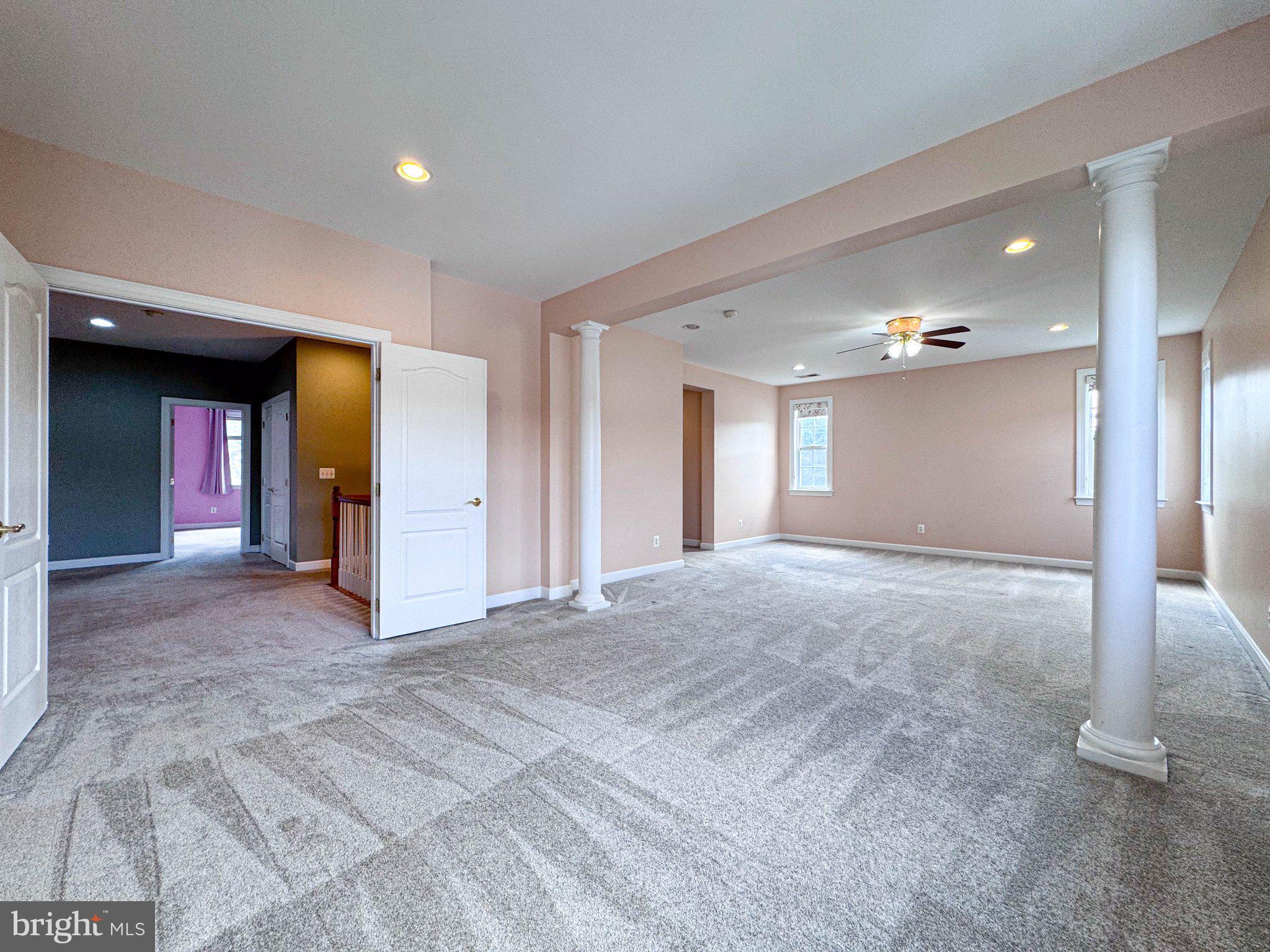 22827 Oakgrove Road Sterling, VA 20166 - Photo 29 of 56 Spacious, light-filled living area.