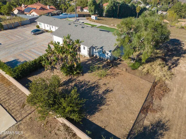 a view of a yard with an outdoor space