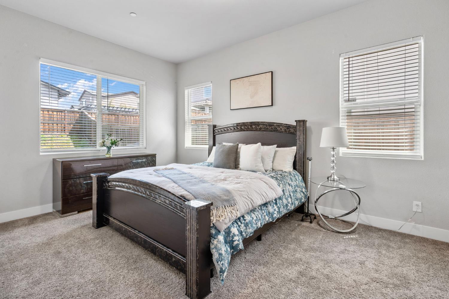 1847 Outrigger Lane Lathrop, CA 95330 - Photo 26 of 54 a bedroom with a bed and window