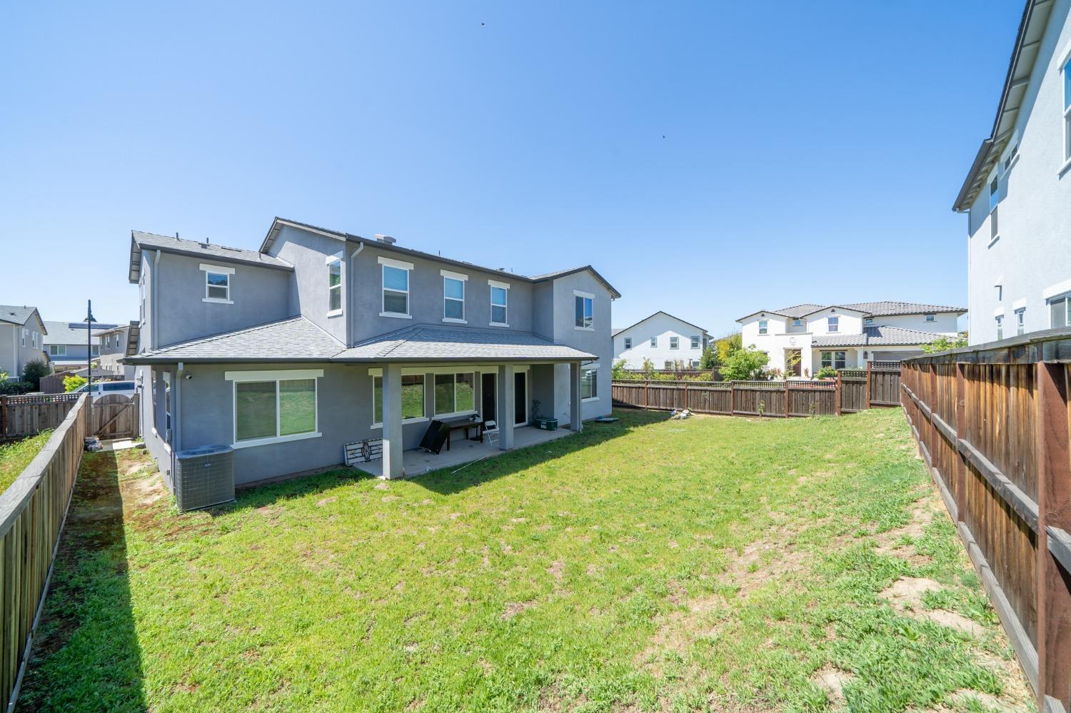 1847 Outrigger Lane Lathrop, CA 95330 - Photo 53 of 54 a view of a house with a swimming pool