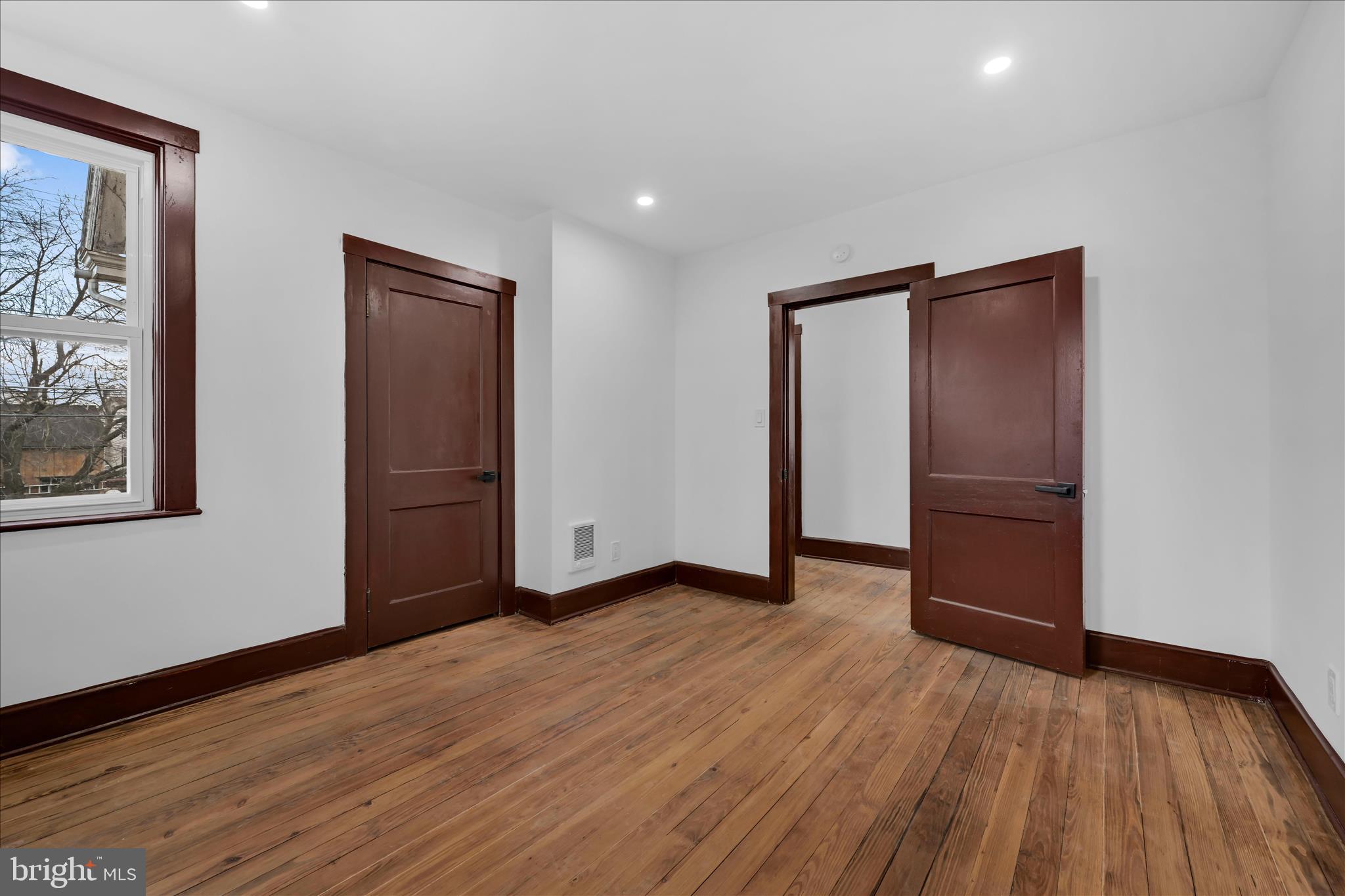 2132 Main Street Lititz, PA 17543 - Photo 24 of 44 a view of an empty room with wooden floor and closet