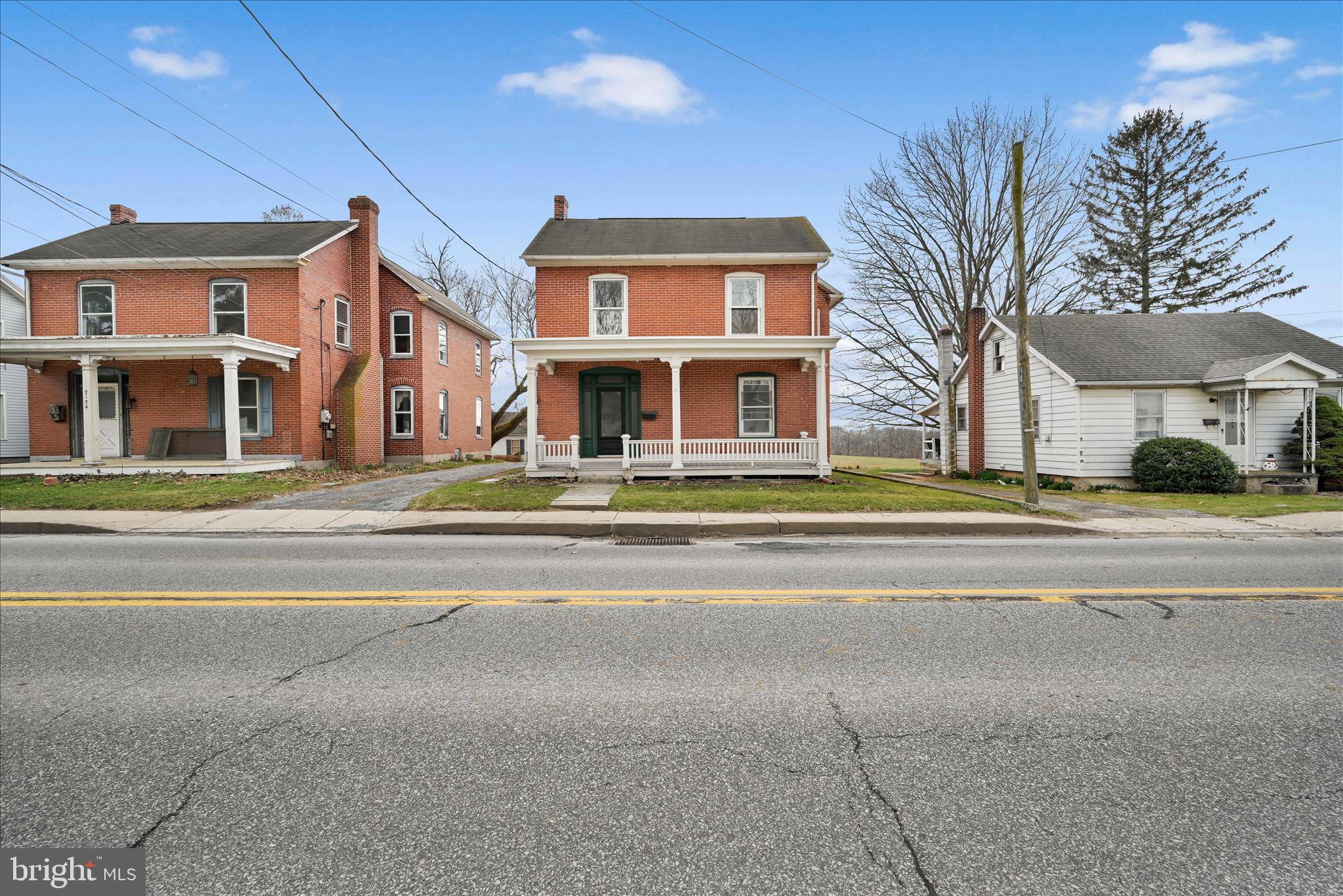 2132 Main Street Lititz, PA 17543 - Photo 3 of 44 a front view of a house with a garden