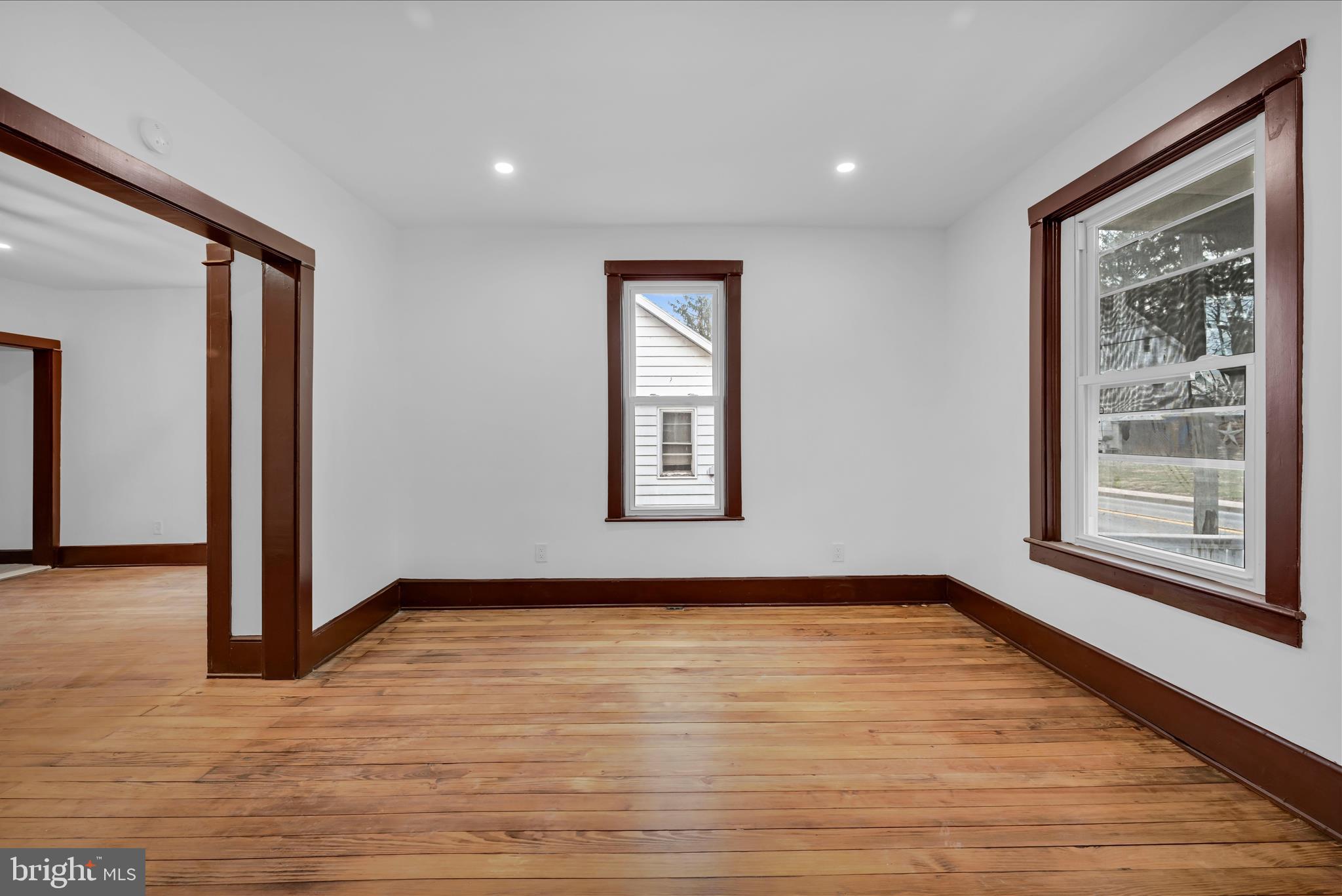 2132 Main Street Lititz, PA 17543 - Photo 7 of 44 a view of an empty room with glass door and wooden floor