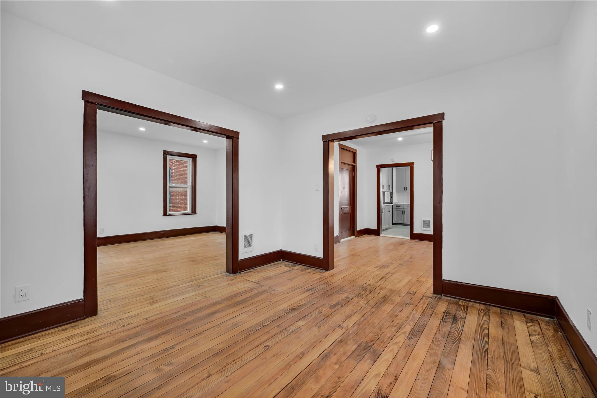 2132 Main Street Lititz, PA 17543 - Photo 8 of 44 a view of empty room with wooden floor and fan