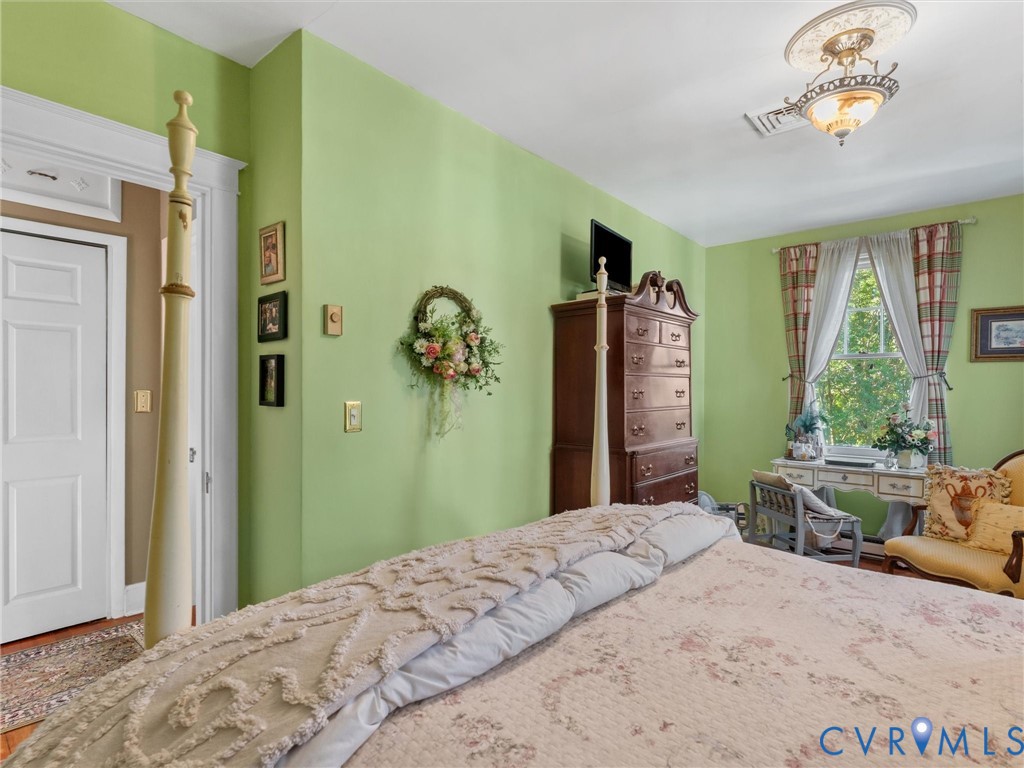 1812 Seddon Road Richmond, VA 23227 - Photo 31 of 56 Room featuring light green walls, white trim, wood