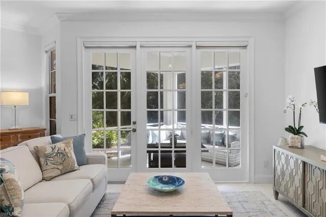 a living room with furniture and window