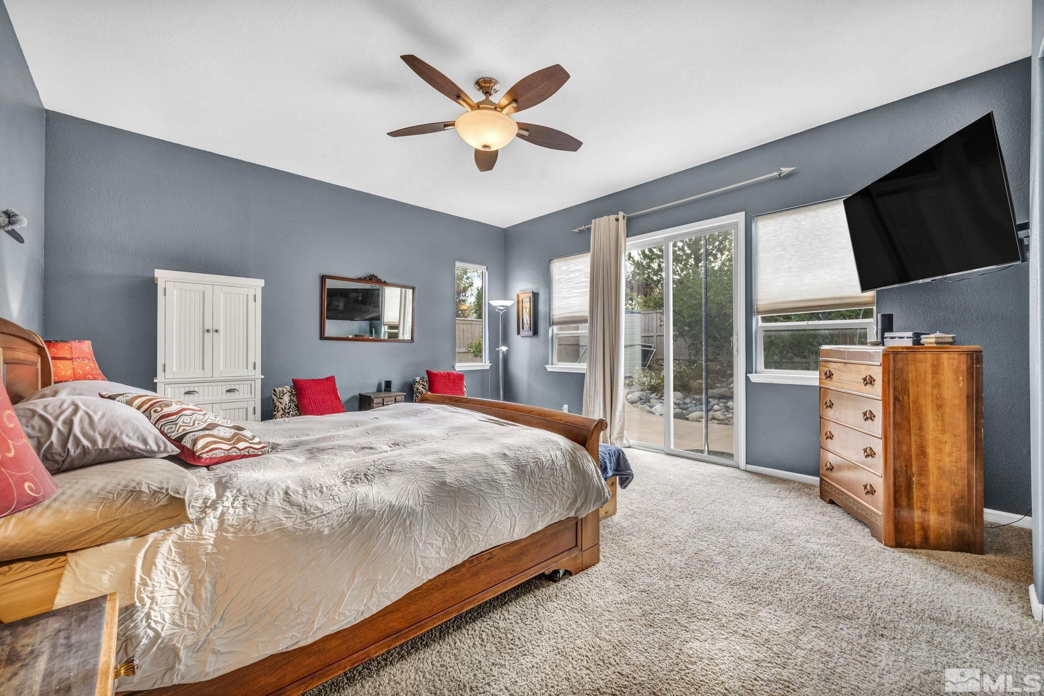 10655 Autumn Walk Lane Reno, NV 89521 - Photo 18 of 40 a living room with furniture and a flat screen tv