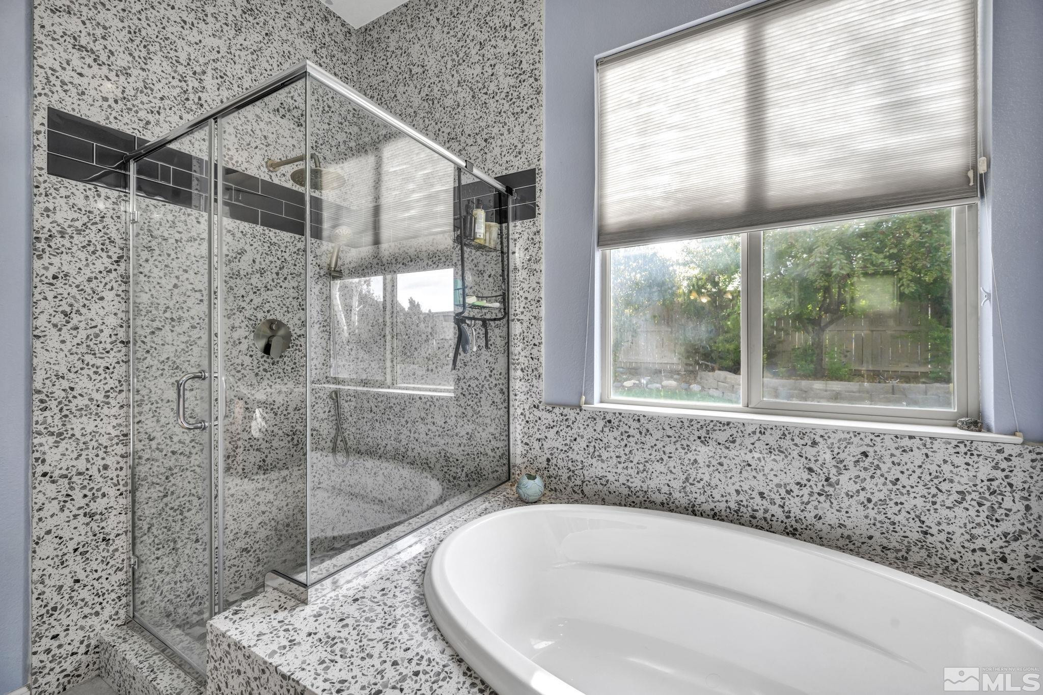 10655 Autumn Walk Lane Reno, NV 89521 - Photo 23 of 40 a bathroom with shower and window