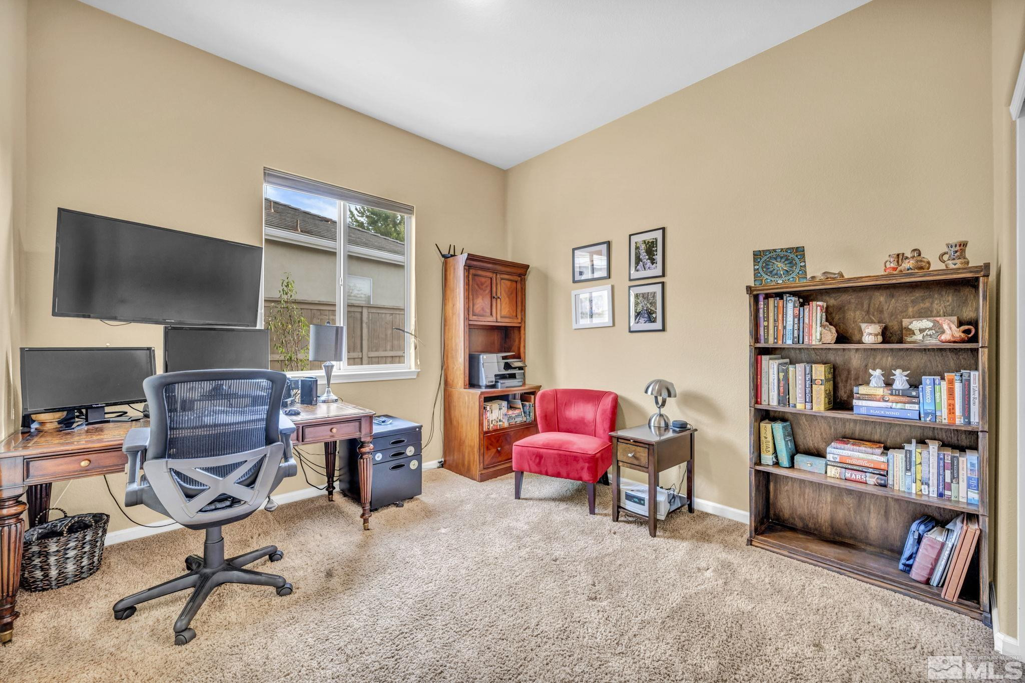 10655 Autumn Walk Lane Reno, NV 89521 - Photo 25 of 40 a view of a workspace with furniture and a window
