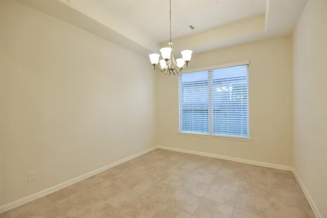 a view of a chandelier in a room