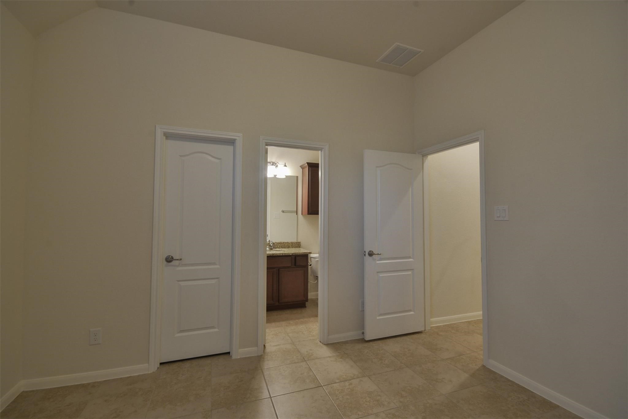 3643 Cottage Pines Lane Spring, TX 77386 - Photo 22 of 33 an empty room with a door and a bathroom