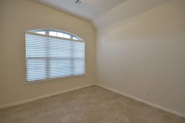 an empty room with a window