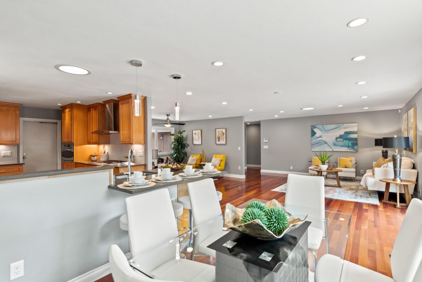 1110 Castleton Way Sunnyvale, CA 94087 - Photo 12 of 27 a living room with furniture a couch and wooden floor