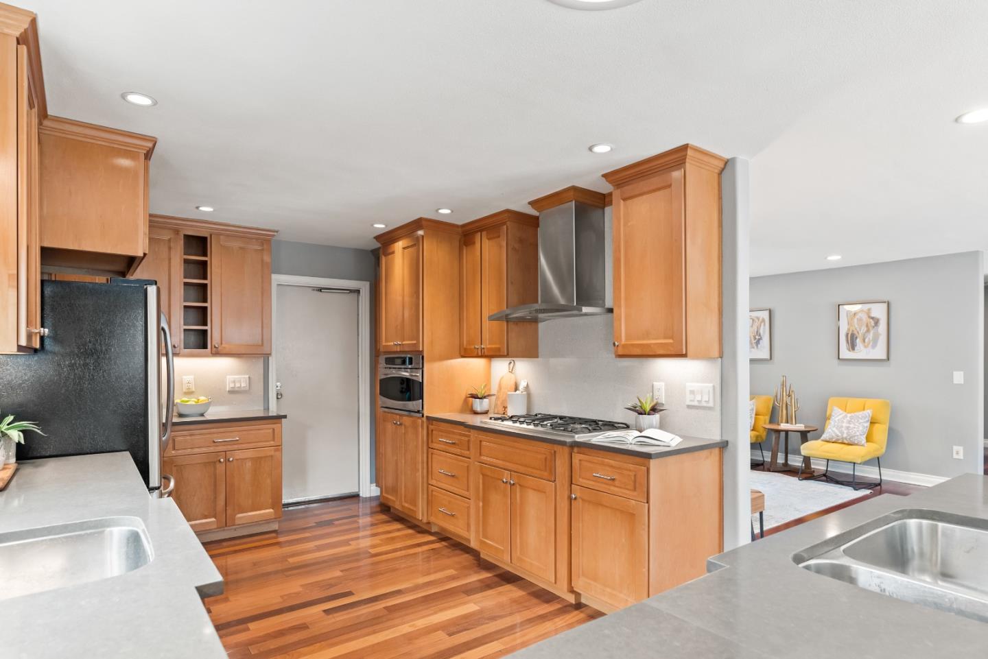 1110 Castleton Way Sunnyvale, CA 94087 - Photo 14 of 27 a kitchen with stainless steel appliances granite countertop a sink dishwasher stove and refrigerator