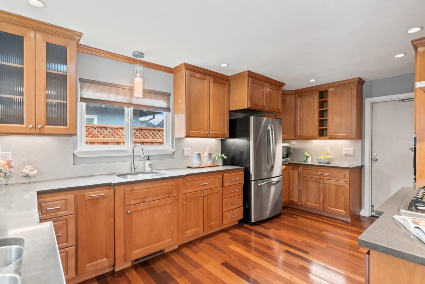 1110 Castleton Way Sunnyvale, CA 94087 - Photo 15 of 27 a kitchen with stainless steel appliances granite countertop a sink stove and refrigerator