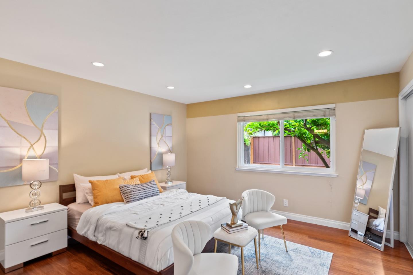 1110 Castleton Way Sunnyvale, CA 94087 - Photo 17 of 27 a bedroom with a bed and a chair