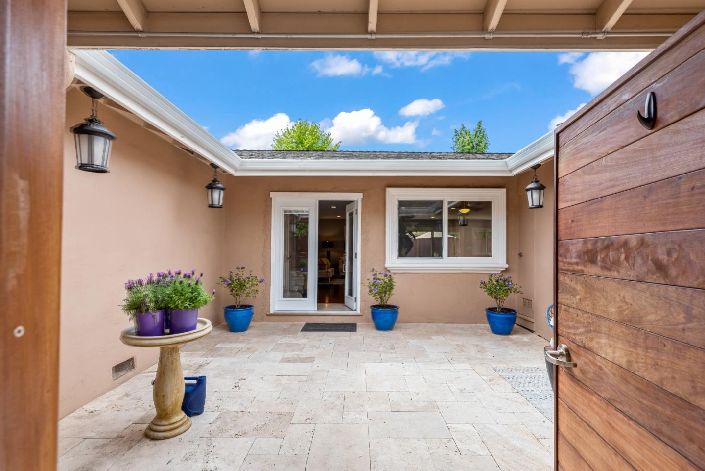 1110 Castleton Way Sunnyvale, CA 94087 - Photo 2 of 27 a front view of a house with a porch