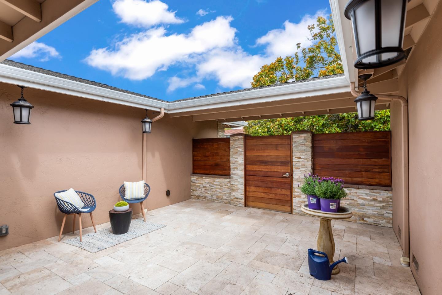 1110 Castleton Way Sunnyvale, CA 94087 - Photo 3 of 27 a front view of a house with patio