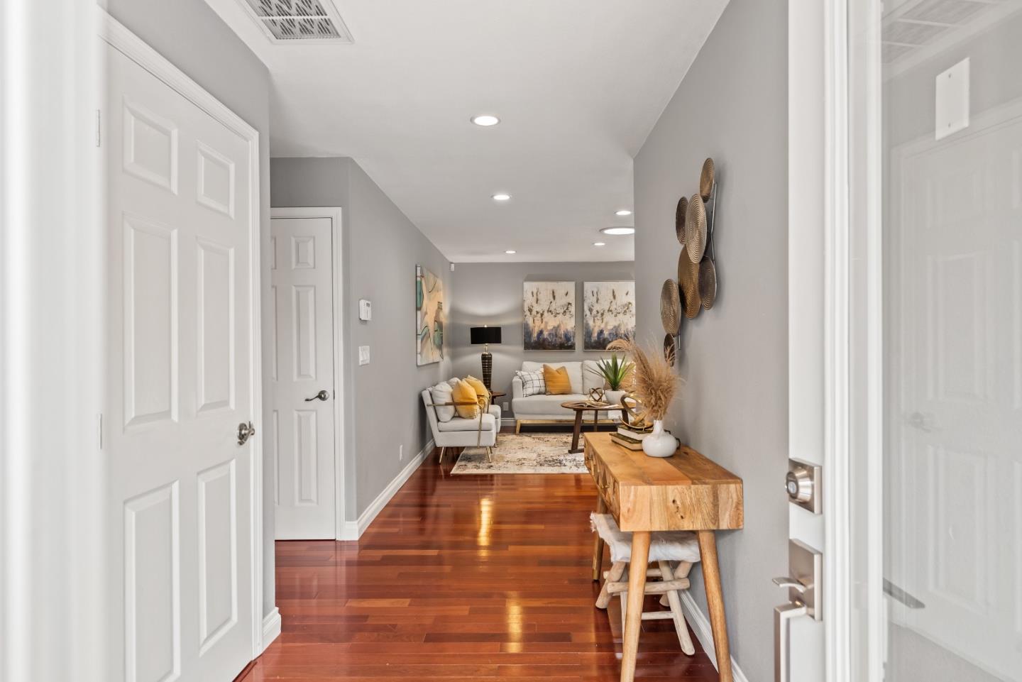 1110 Castleton Way Sunnyvale, CA 94087 - Photo 4 of 27 a living room with furniture a rug and a painting on the wall