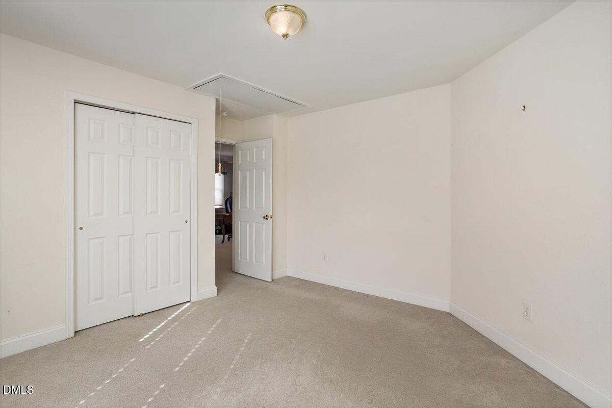 9120 Sanctuary Court Raleigh, NC 27617 - Photo 42 of 80 a view of an empty room