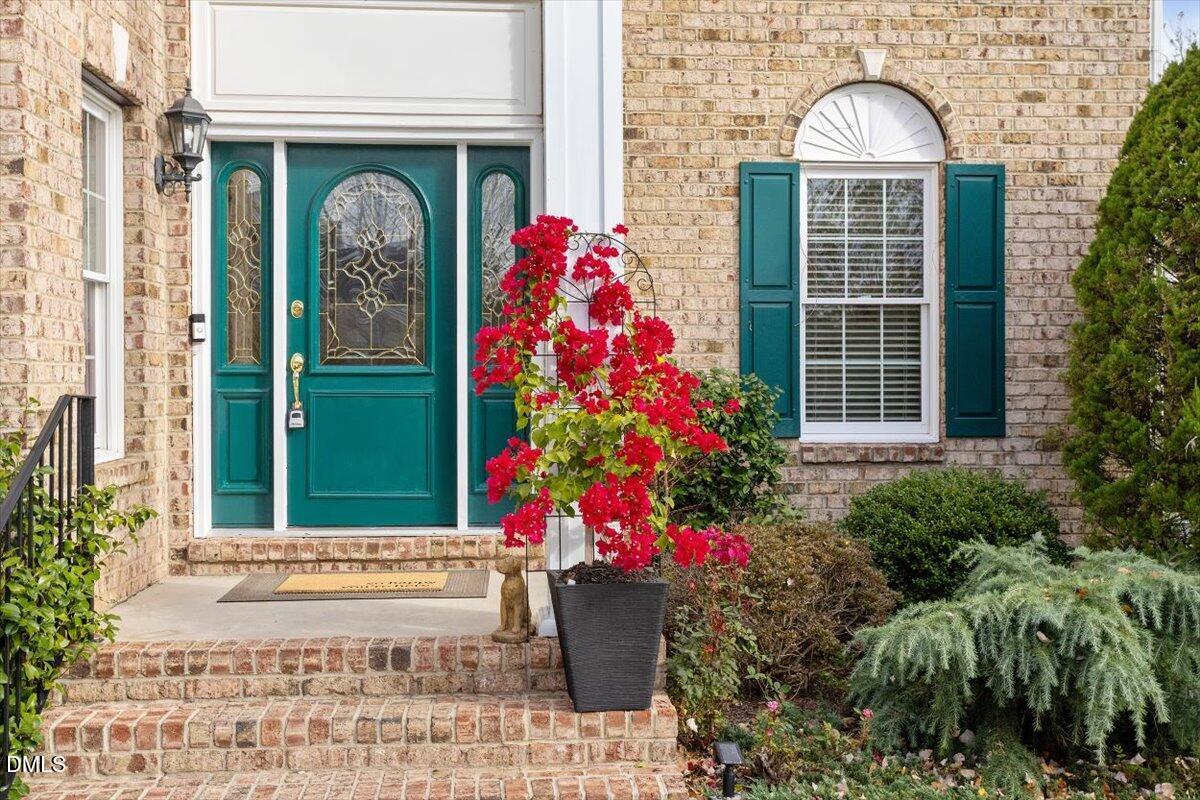 9120 Sanctuary Court Raleigh, NC 27617 - Photo 4 of 80 a front view of a house with outdoor