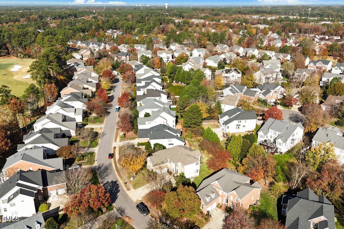 9120 Sanctuary Court Raleigh, NC 27617 - Photo 53 of 80 an aerial view of residential houses with outdoor space