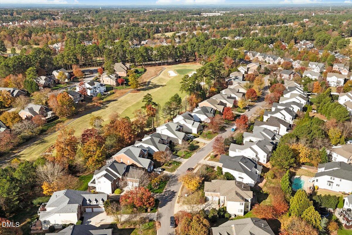 9120 Sanctuary Court Raleigh, NC 27617 - Photo 54 of 80 an aerial view of residential building with parking space