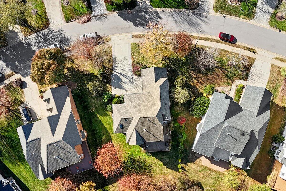9120 Sanctuary Court Raleigh, NC 27617 - Photo 63 of 80 an aerial view of a house with a yard and garden