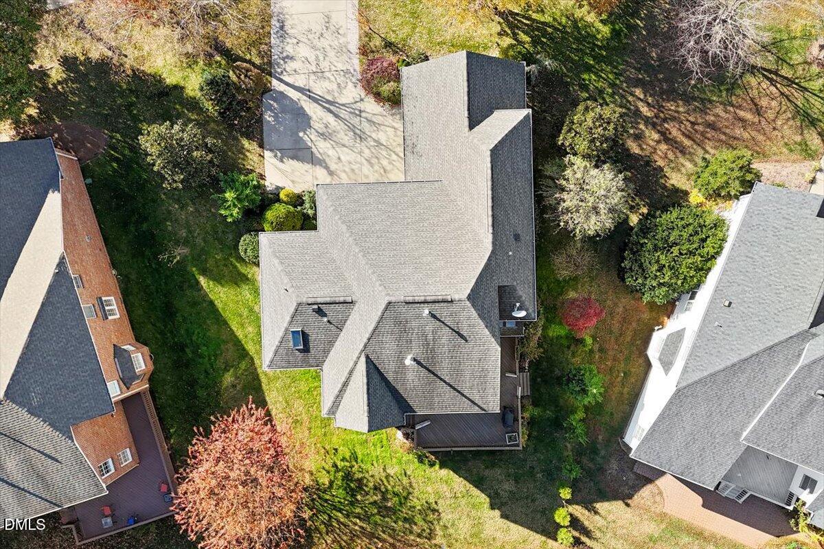 9120 Sanctuary Court Raleigh, NC 27617 - Photo 64 of 80 an aerial view of a house with outdoor space and a lake view