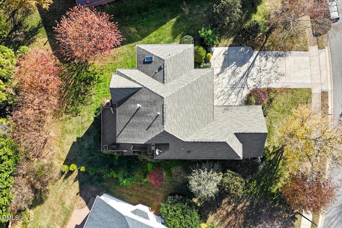 9120 Sanctuary Court Raleigh, NC 27617 - Photo 65 of 80 an aerial view of a house with a yard