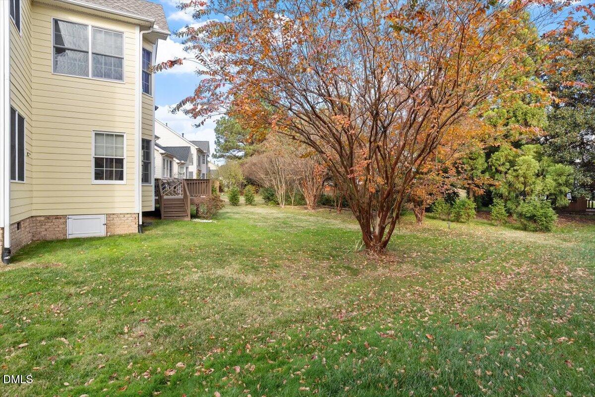 9120 Sanctuary Court Raleigh, NC 27617 - Photo 6 of 80 a view of a backyard with large trees