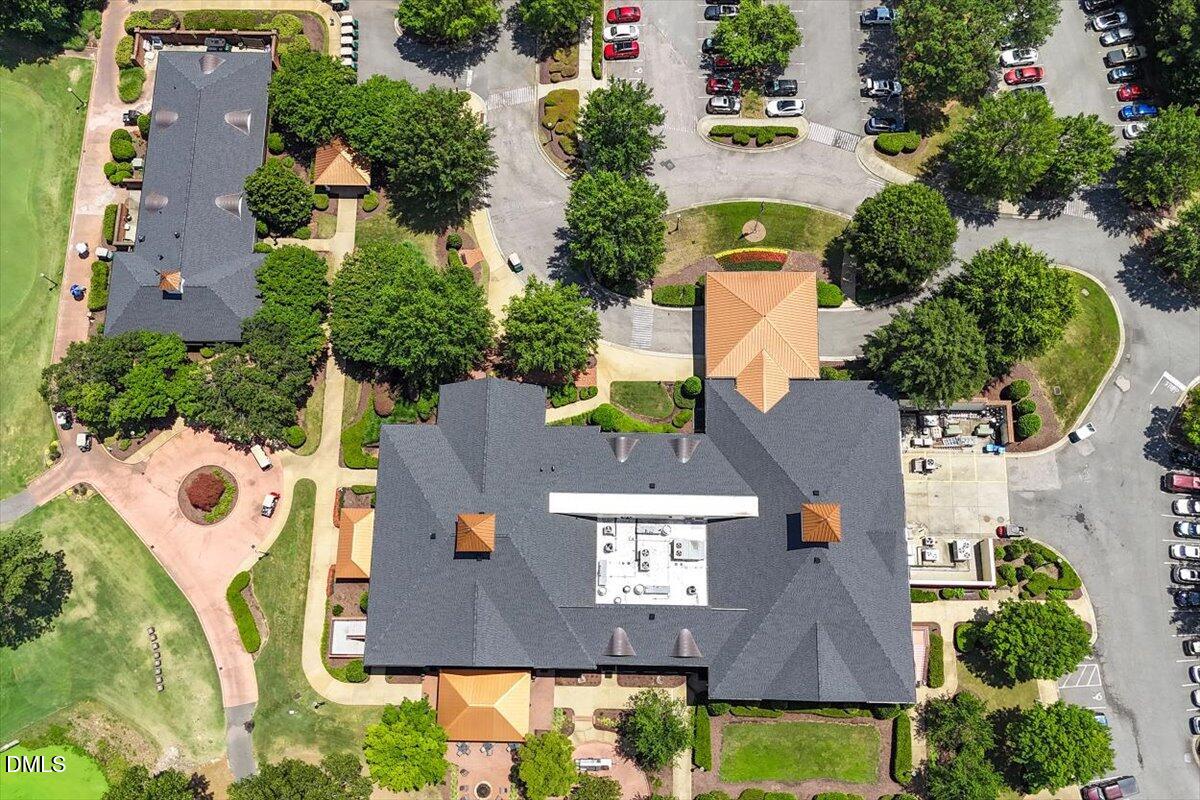 9120 Sanctuary Court Raleigh, NC 27617 - Photo 70 of 80 an aerial view of house with yard swimming pool and outdoor seating