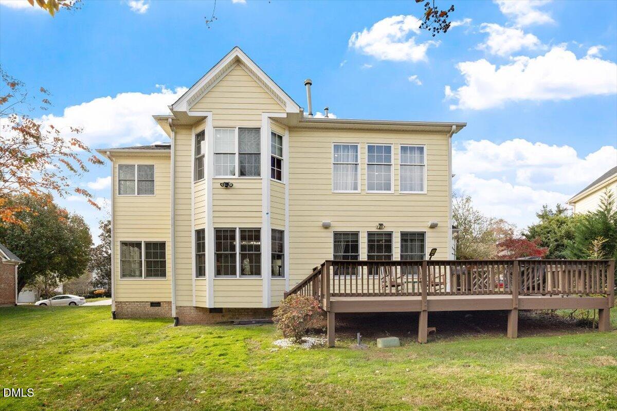9120 Sanctuary Court Raleigh, NC 27617 - Photo 7 of 80 a front view of a house with a garden