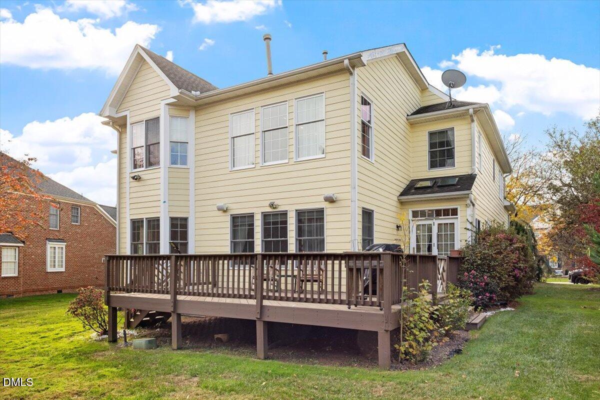 9120 Sanctuary Court Raleigh, NC 27617 - Photo 8 of 80 a view of a house with a yard