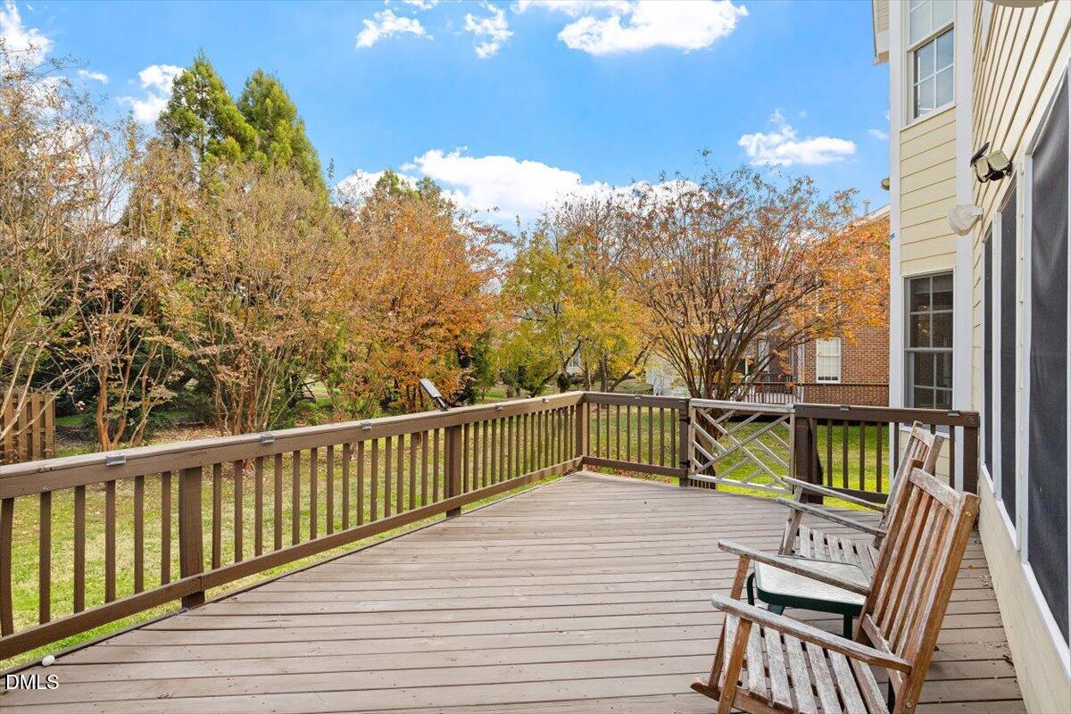 9120 Sanctuary Court Raleigh, NC 27617 - Photo 9 of 80 a view of a balcony with two chairs