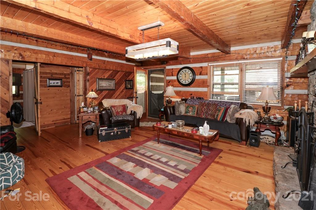 36 Maney Branch Road Weaverville, NC 28787 - Photo 11 of 42 a view of a chairs and table in the patio