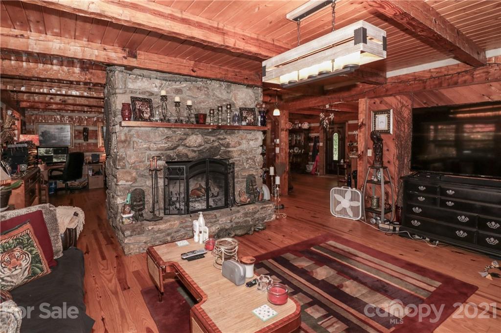 36 Maney Branch Road Weaverville, NC 28787 - Photo 12 of 42 a view of a chairs and table in the patio
