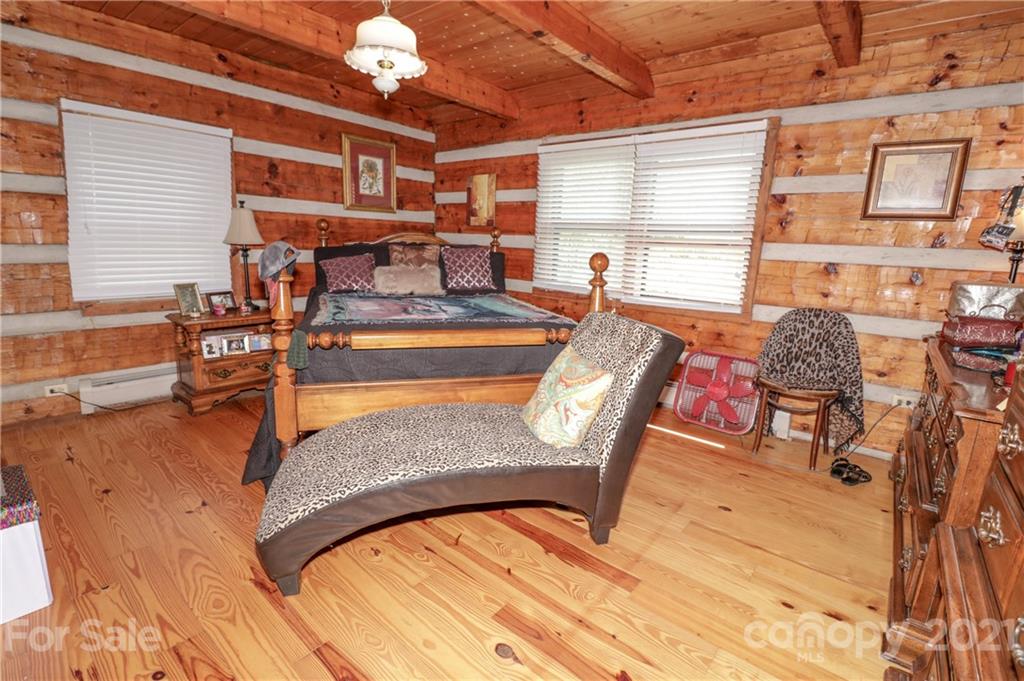 36 Maney Branch Road Weaverville, NC 28787 - Photo 16 of 42 a view of a dining room with furniture window and outside view