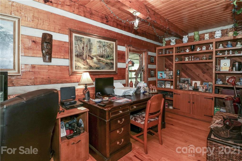 36 Maney Branch Road Weaverville, NC 28787 - Photo 24 of 42 a outdoor living space with patio furniture and a fireplace